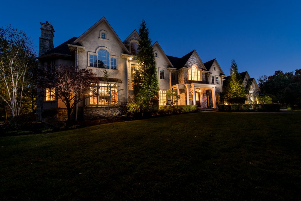 Night photo of old tappan mansion for sale